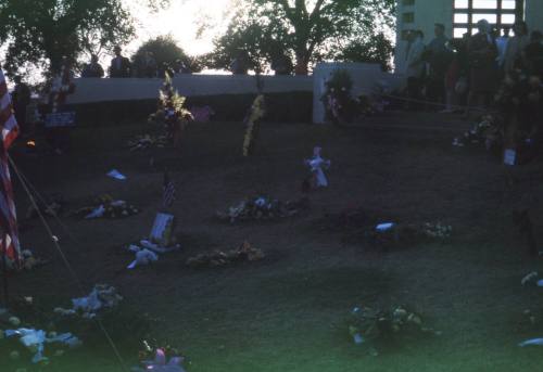 Image of floral tributes in Dealey Plaza after the assassination, Slide #19