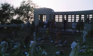 Image of floral tributes in Dealey Plaza after the assassination, Slide #23