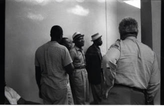 Image inside courthouse during hearing related to 1964 civil rights protest
