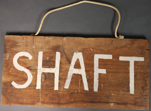 Wooden "SHAFT" sign from the Texas School Book Depository