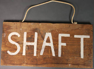 Wooden "SHAFT" sign from the Texas School Book Depository