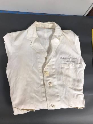 Physician's lab coat worn by Dr. Ronald C. Jones at Parkland Memorial Hospital