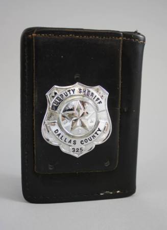 Luke Mooney's Dallas County Deputy Sheriff's badge