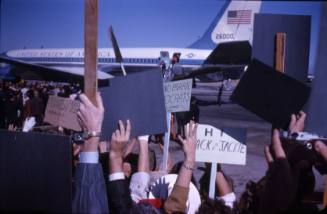 Image of the Kennedys disembarking Air Force One at Dallas Love Field