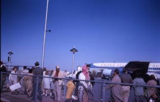 Image of Air Force One and crowds at Love Field