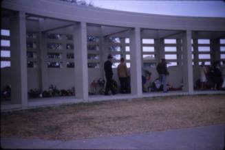 Image of floral tributes left at Dealey Plaza