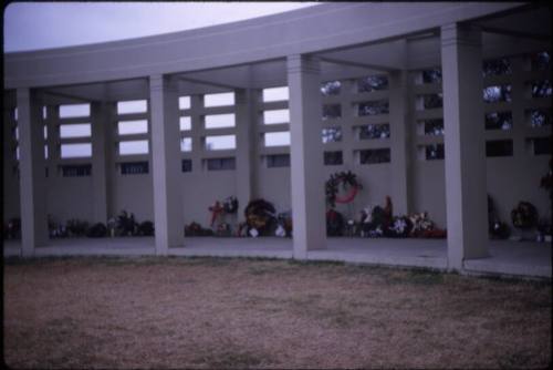 Image of floral tributes left at Dealey Plaza