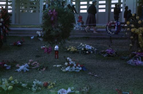 Image of floral tributes in Dealey Plaza after the assassination, Slide #17