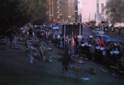 Image of crowds in Dealey Plaza after the assassination, Slide #36